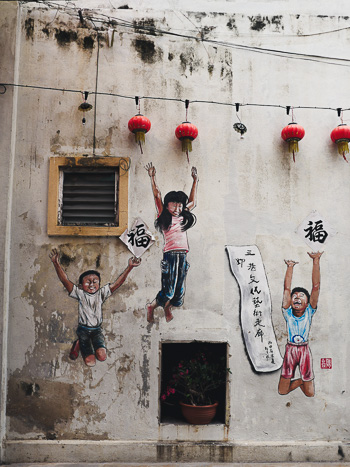 A mural of children in the city of Ipoh, Malaysia.